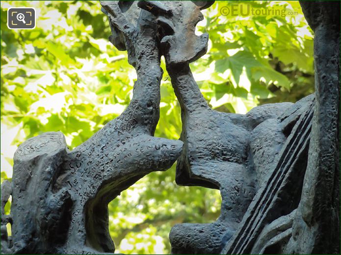 Additional face on Le Poete statue