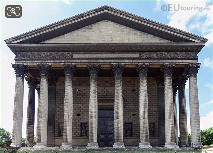 Eglise de la Madeleine with Saint John the Evangelist Statue