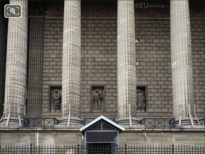 East facade of Eglise de la Madeleine with Saint Bernard statue