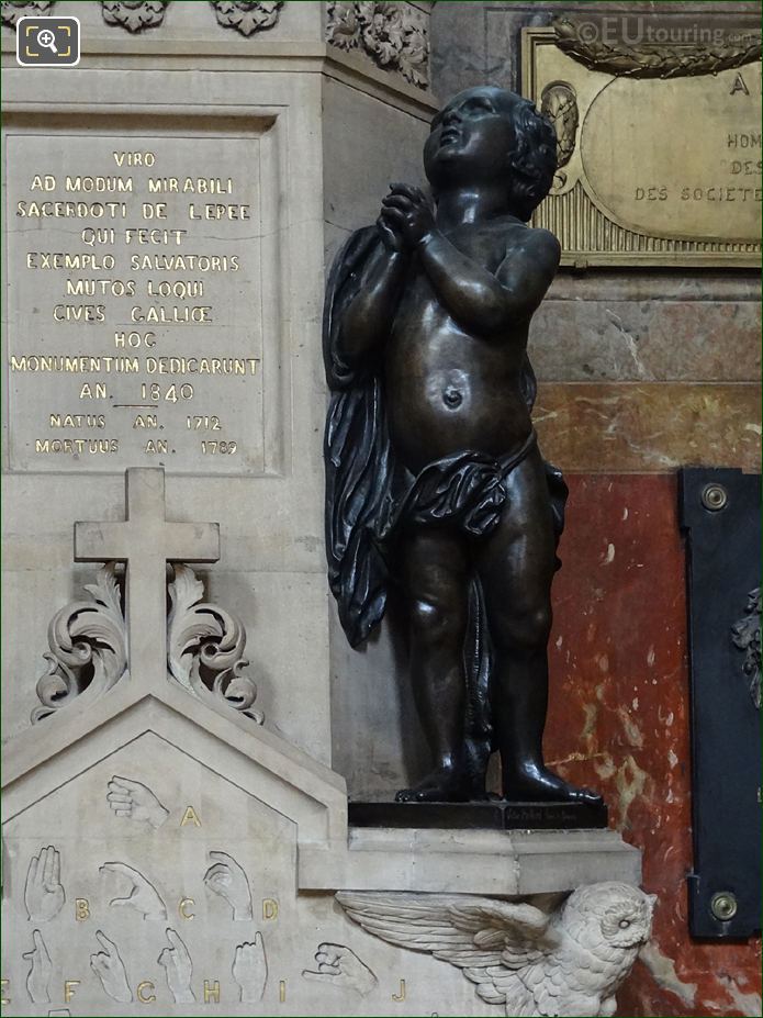 Young boy statue on Monument de l'Abbe de l'Epee