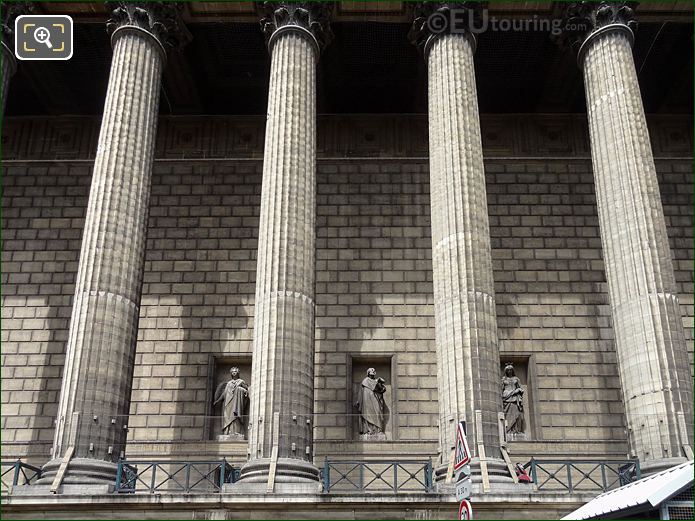 East facade, Eglise de la Madeleine in Paris with Saint Irenee statue