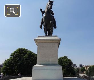 Bronze statue of King Henri IV on pedestal in Paris
