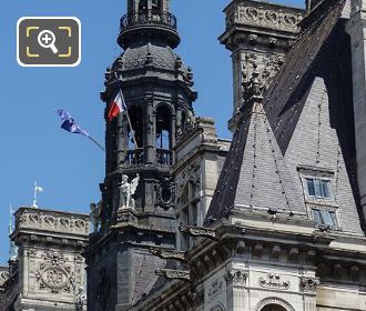 Black bell tower and statues on Hotel de Ville