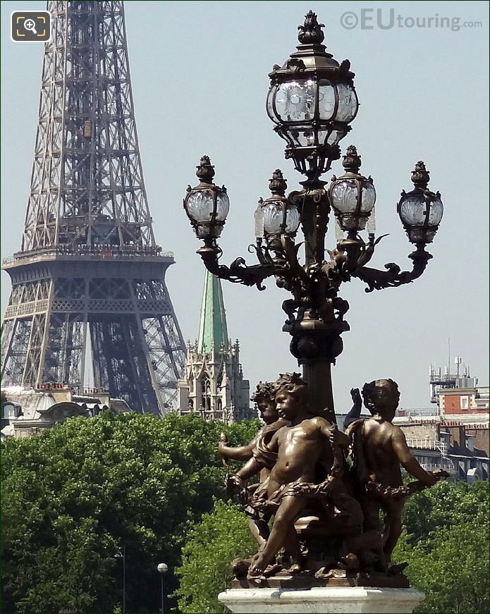 Pont Alexandre III Cupid and Sea Monster statues in Paris