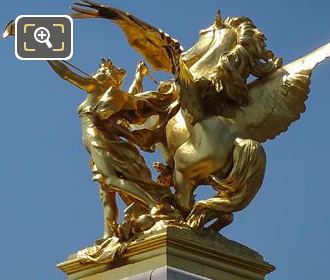 Gilded Pegasus being held by Fame statue