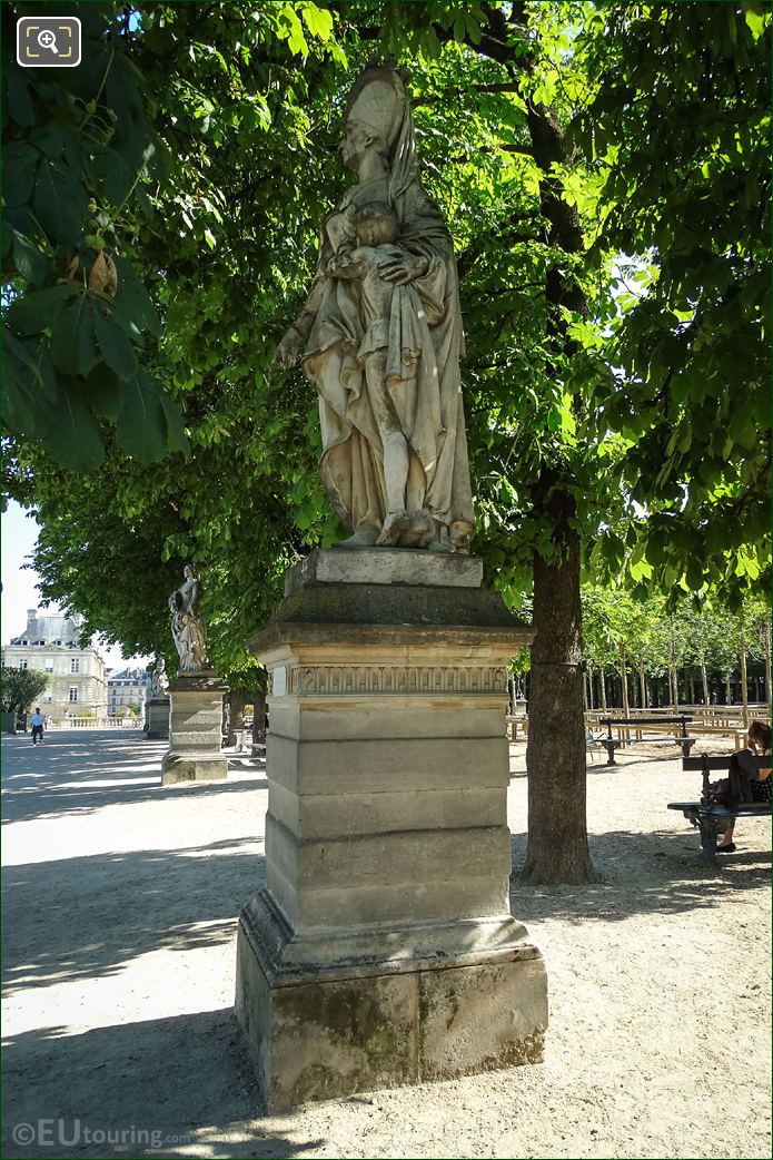 Marble statue Marguerite of Anjou on stone pedestal