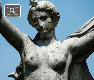 Woman on l'Aurore statue within Paris