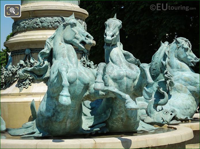 Statues of horses on water fountain