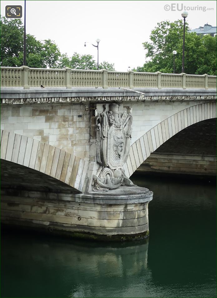 Maritime military trophy sculpture on Pont des Invalides west side