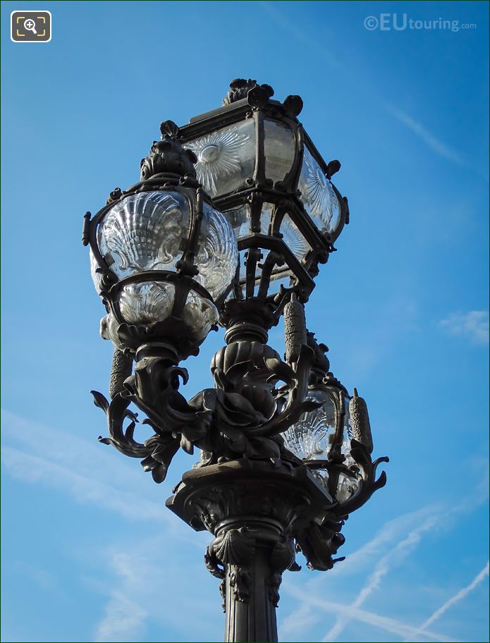 Bronze and glass street lamps on top of Pont Alexandre III