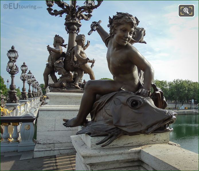 Enfant au Poisson statue by Andre Massoule