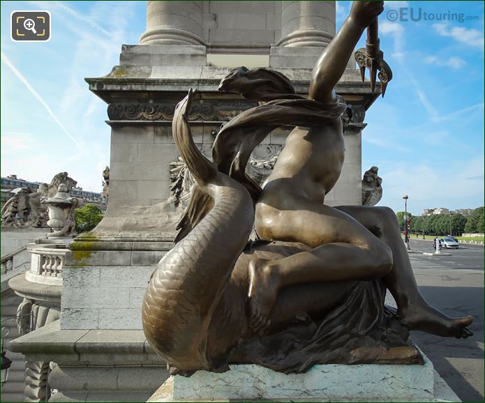 Back view of Enfant au Poisson statue