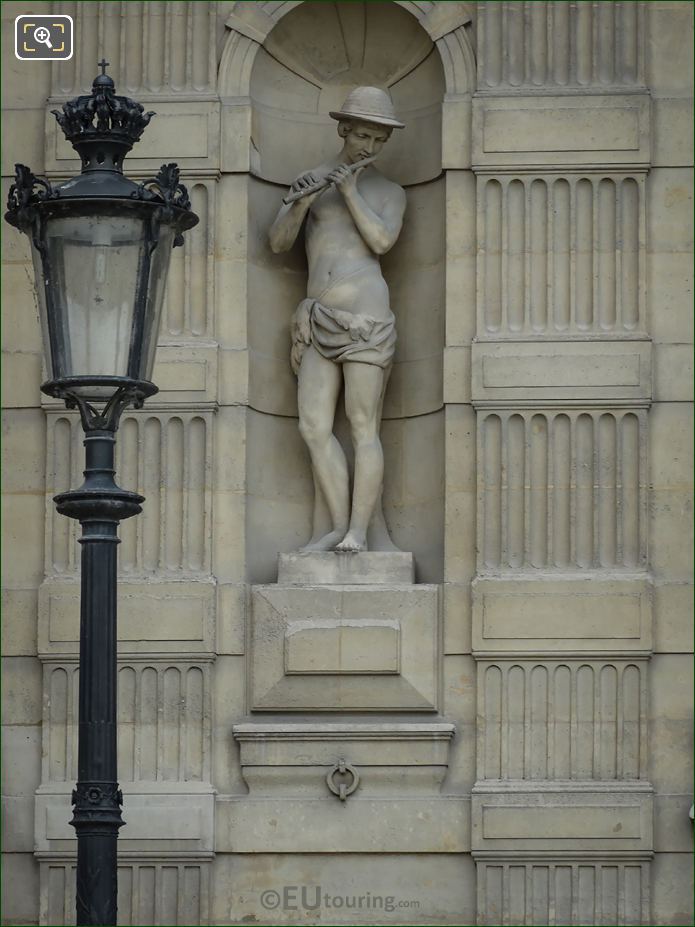 Le Fluteur statue on Aile de Flore