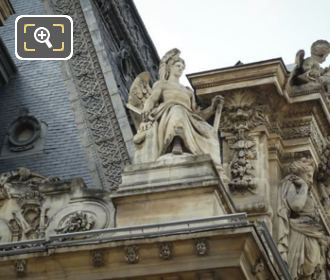 La Puissance statue on Pavillon Mollien at Musee du Louvre