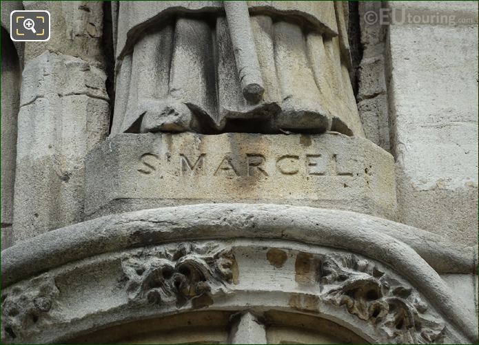 St Marcel inscription on facade of Saint-Germain l'Auxerrois Church