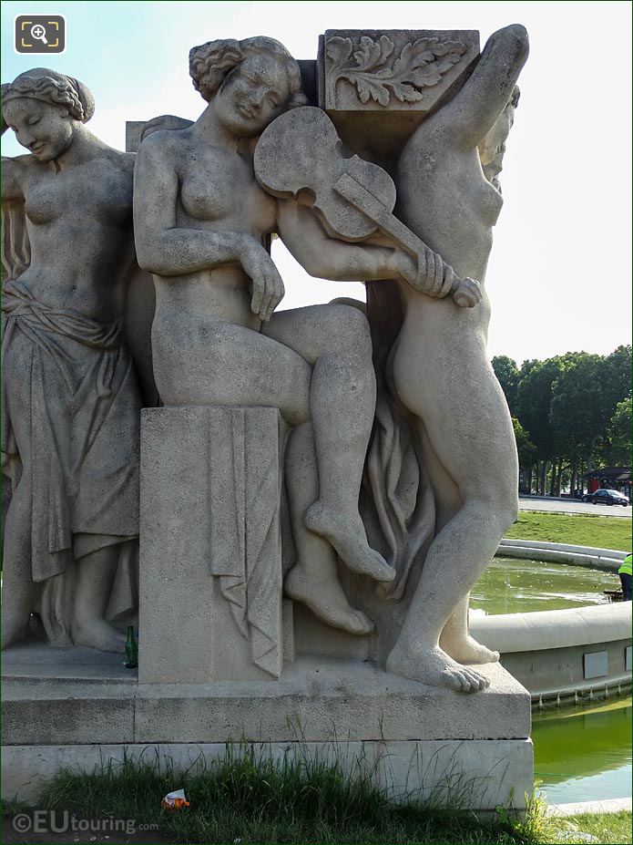 Female playing violin NW side La Joie de Vivre statue