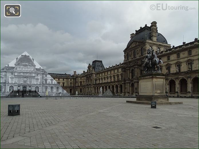 King Louis XIV equestrian statue inside Cour Napoleon at Musee du Louvre