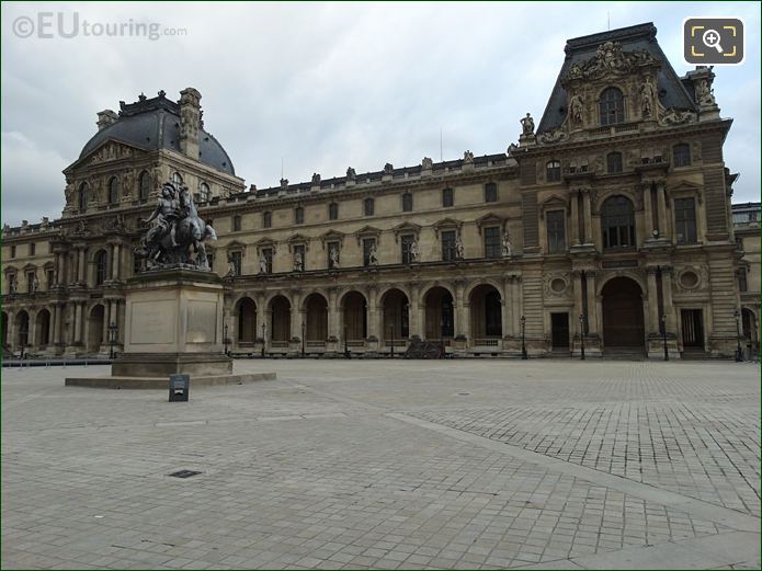 King Louis XIV statue with Aile Mollien behind