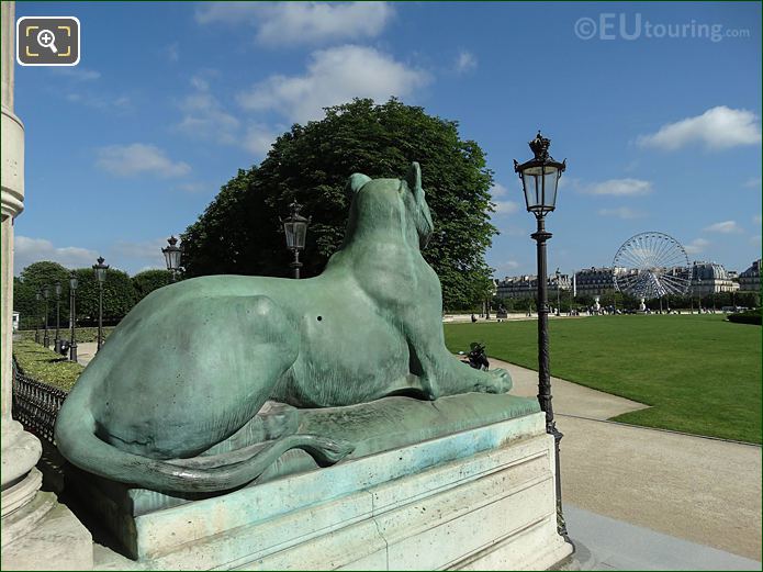 Porte Jaujard lioness statue looking over Cour du Carrousel