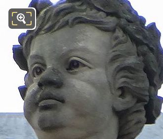 Child's face of Histoire statue by Joseph Michel Caille