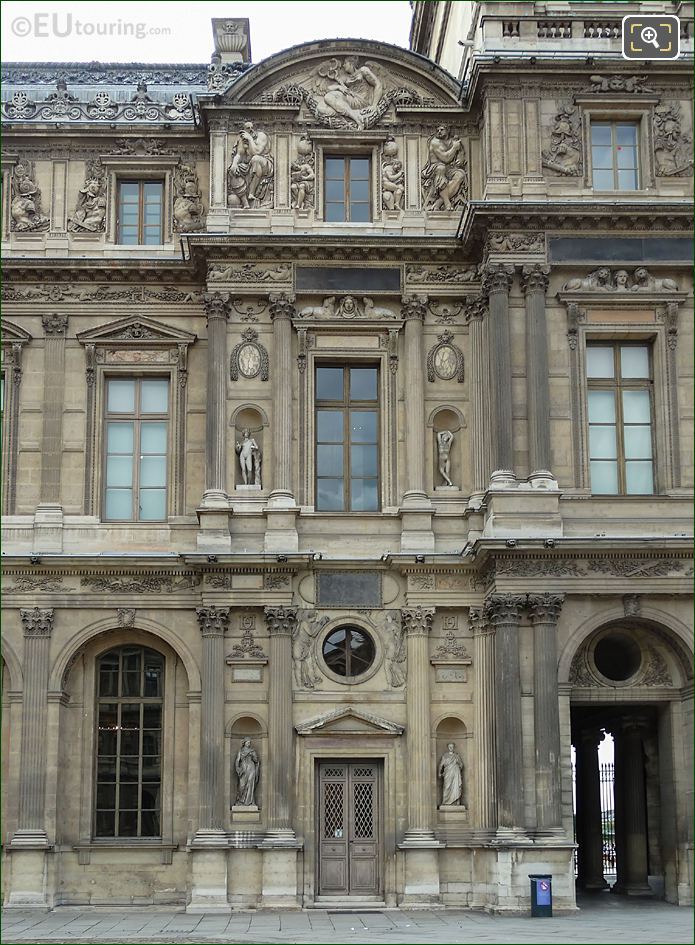 The Louvre Aile Lescot East facade with Genie de l'etude Lisant sculpture