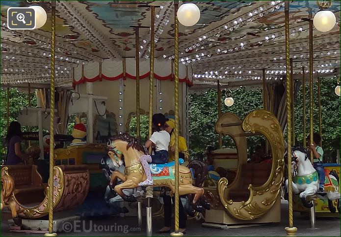 Wooden horses on merry-go-round Jardin des Tuileries