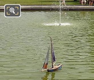 SE view over model sailing boat pond Tuileries Gardens
