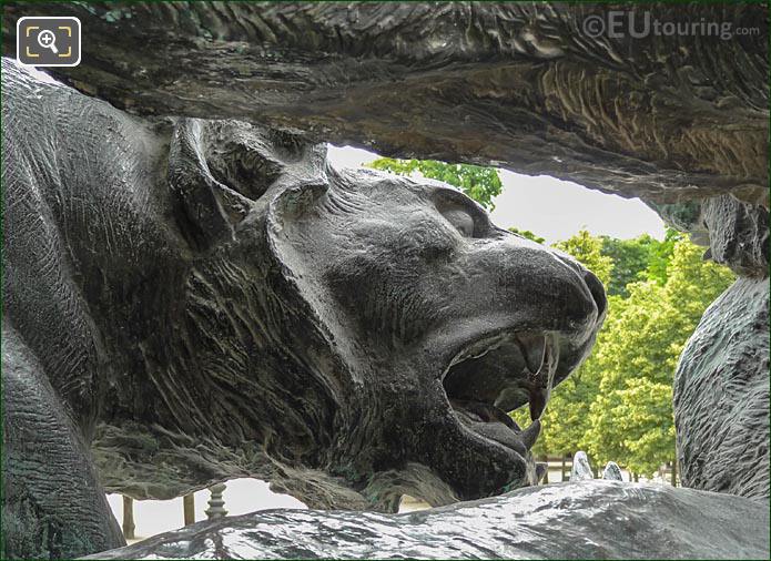 Lion and lioness statue group by A Cain