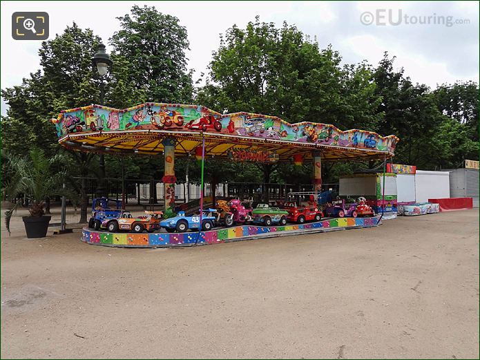 Childrens fairground ride Summer Fete des Tuileries