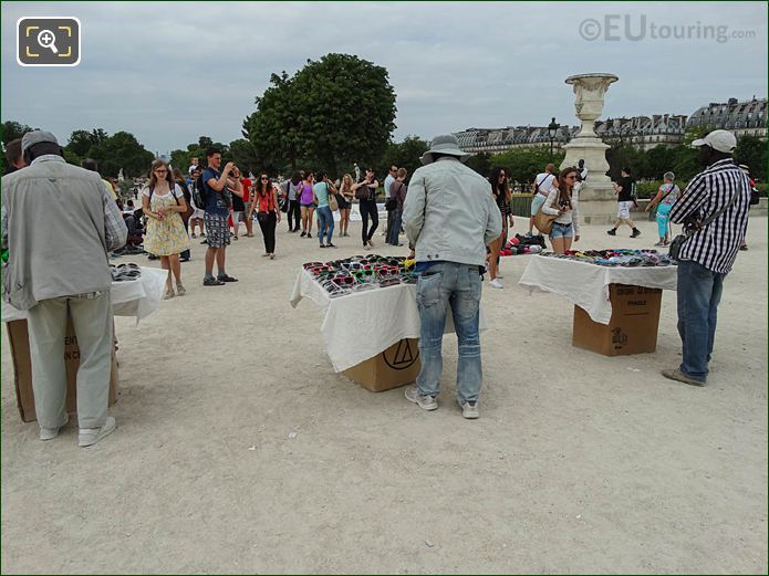 Street sellers on Terrasse des Tuileries looking NW